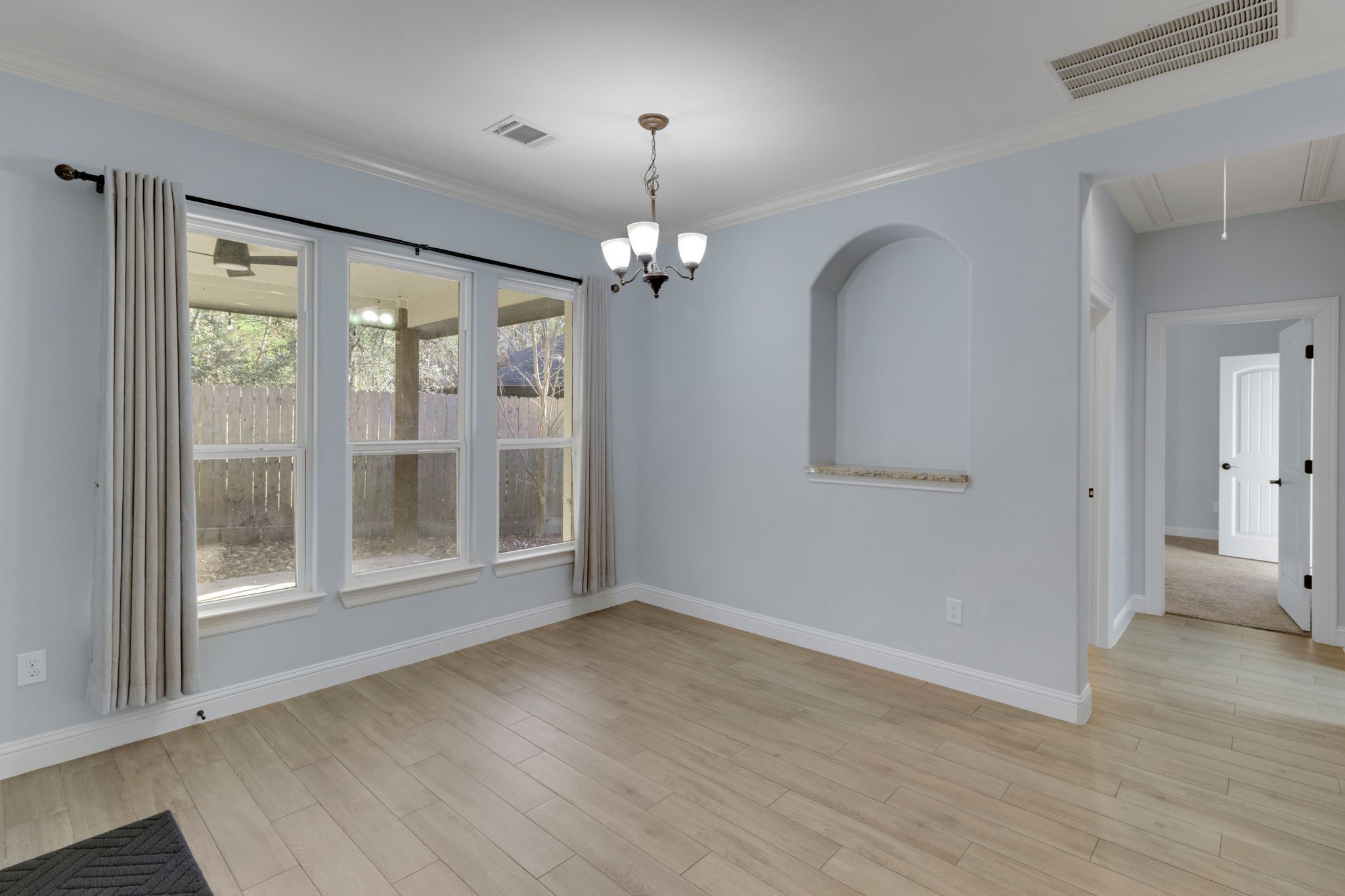30 Beachwood Way Coldspring, TX 77331 - Photo 16 of 47 wooden floor in an empty room with a window