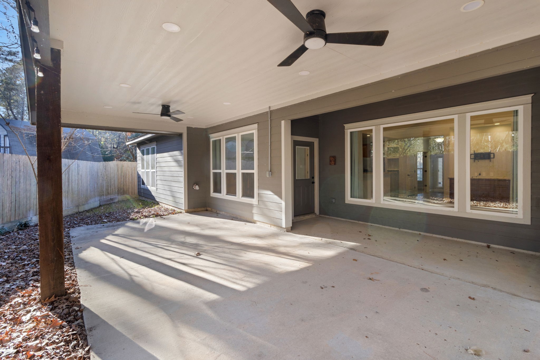 30 Beachwood Way Coldspring, TX 77331 - Photo 33 of 47 a view of a hallway with wooden floor and a ceiling fan