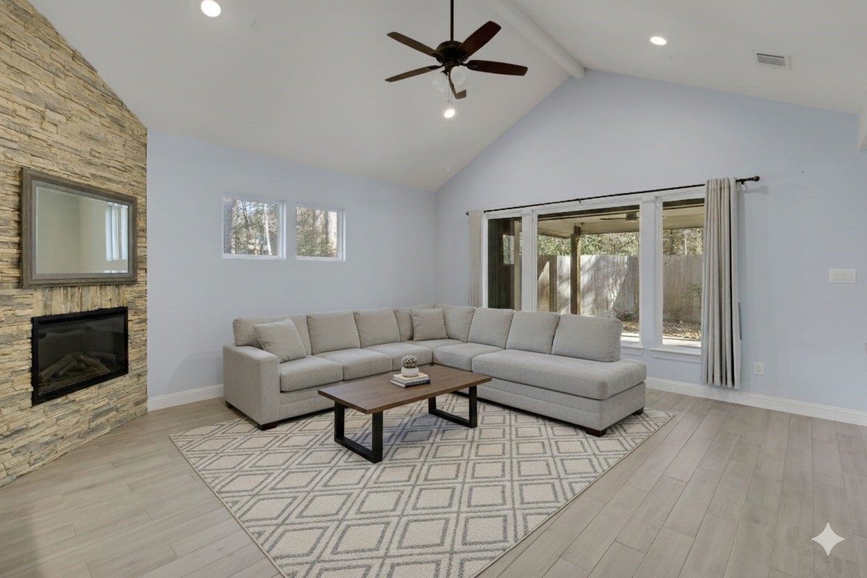 30 Beachwood Way Coldspring, TX 77331 - Photo 5 of 47 a living room with furniture and a fireplace