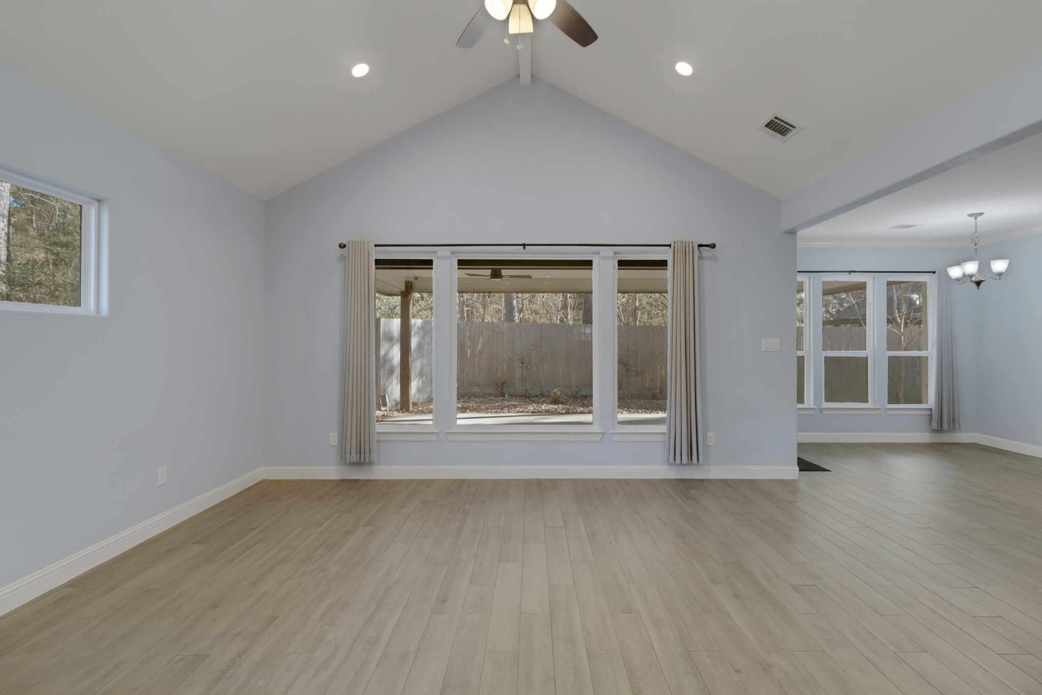 30 Beachwood Way Coldspring, TX 77331 - Photo 7 of 47 a view of wooden floor in an empty room with a window