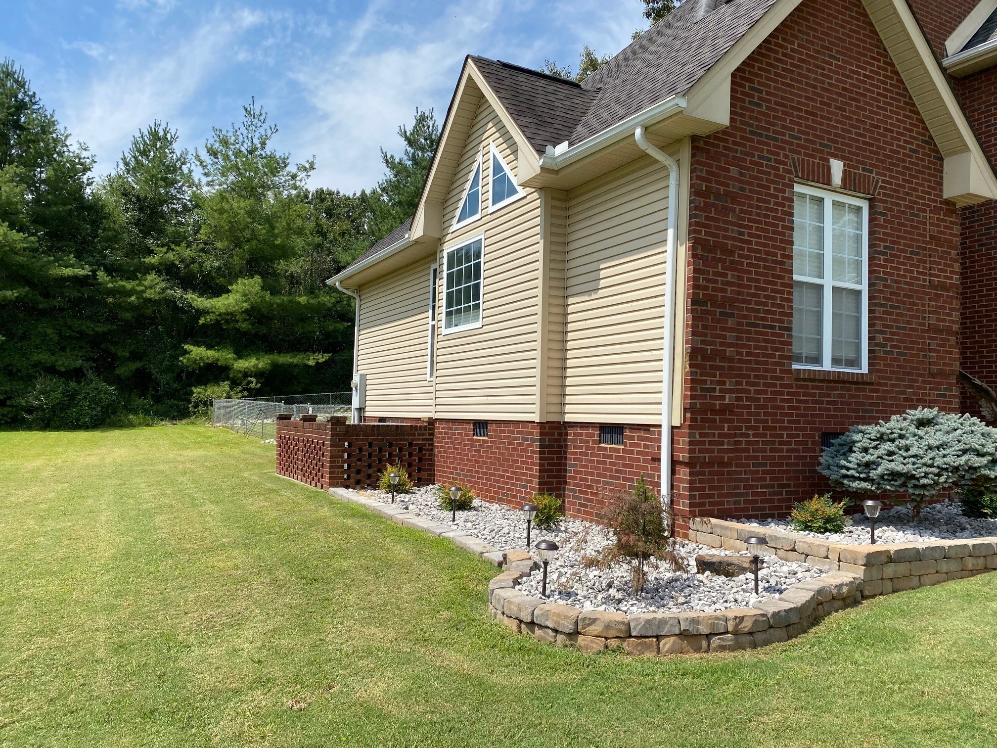 128 Simons Boulevard Morrison, TN 37357 - Photo 14 of 65 a front view of a house with a yard