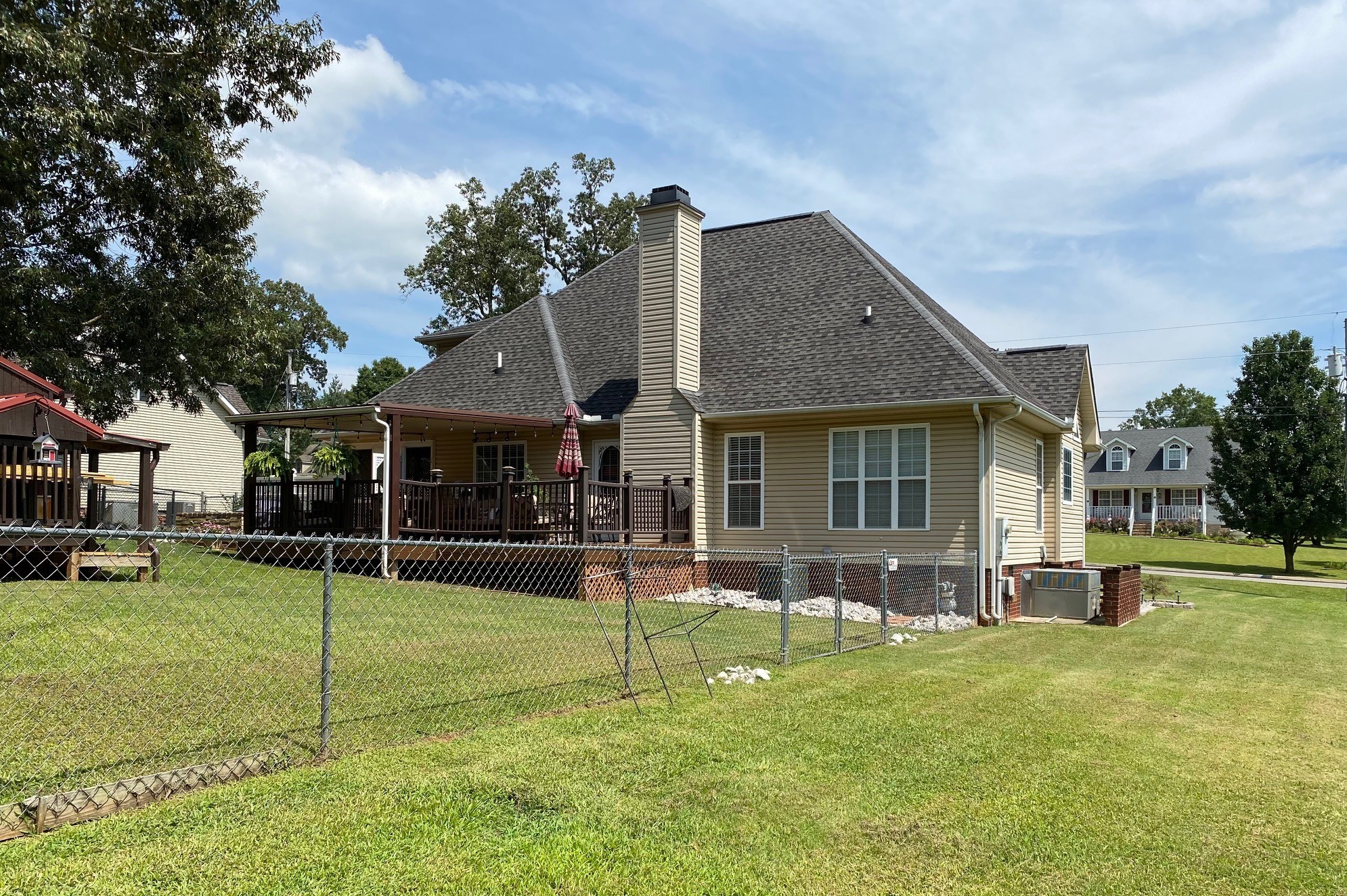 128 Simons Boulevard Morrison, TN 37357 - Photo 19 of 65 a front view of house with a garden and patio