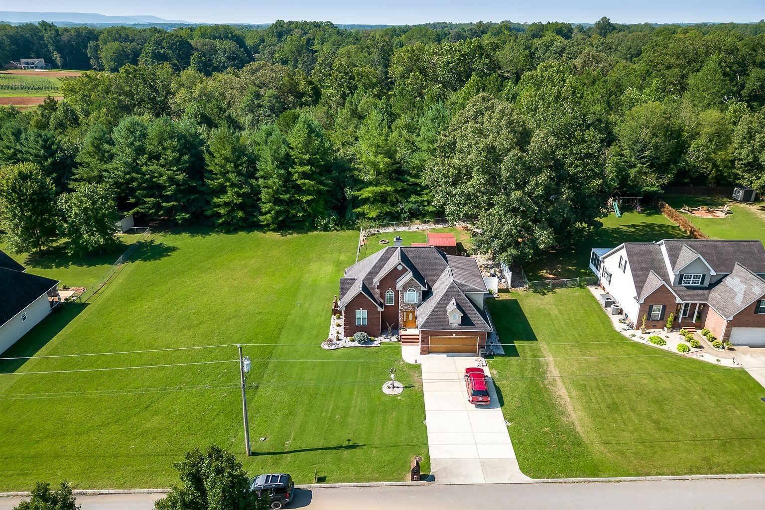 128 Simons Boulevard Morrison, TN 37357 - Photo 24 of 65 an aerial view of a house with outdoor space pool patio and outdoor seating