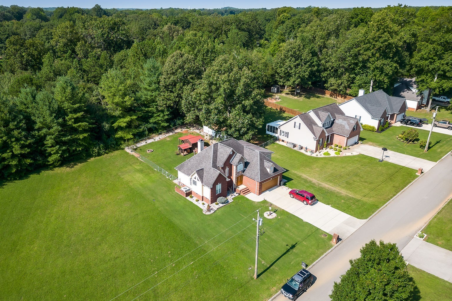 128 Simons Boulevard Morrison, TN 37357 - Photo 25 of 65 an aerial view of a house with a garden