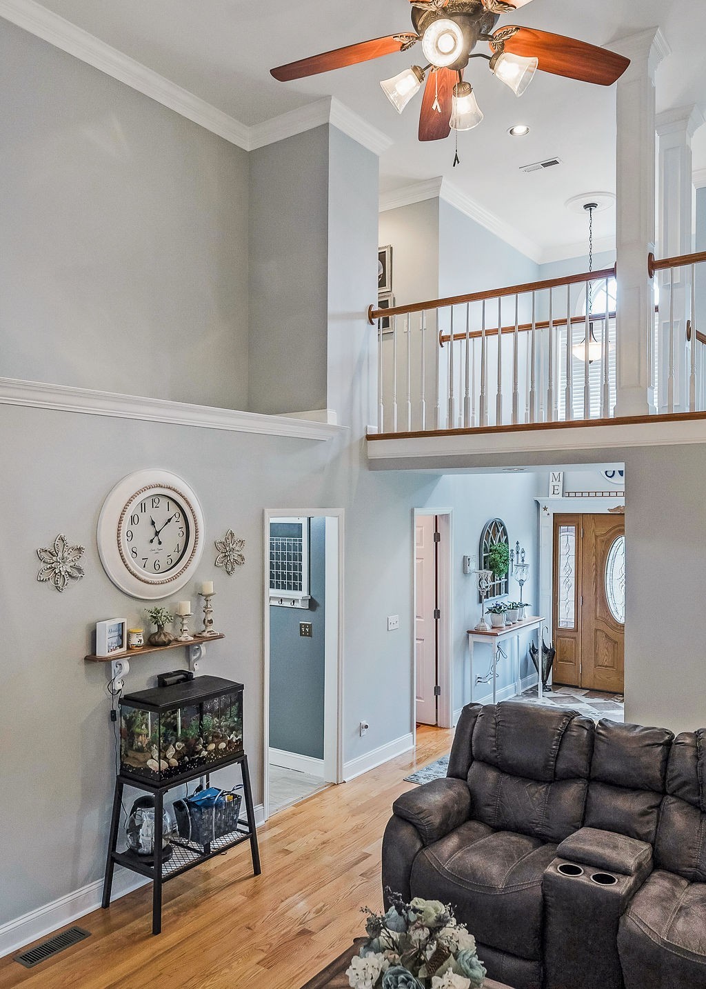 128 Simons Boulevard Morrison, TN 37357 - Photo 34 of 65 a living room with furniture a rug and a chandelier