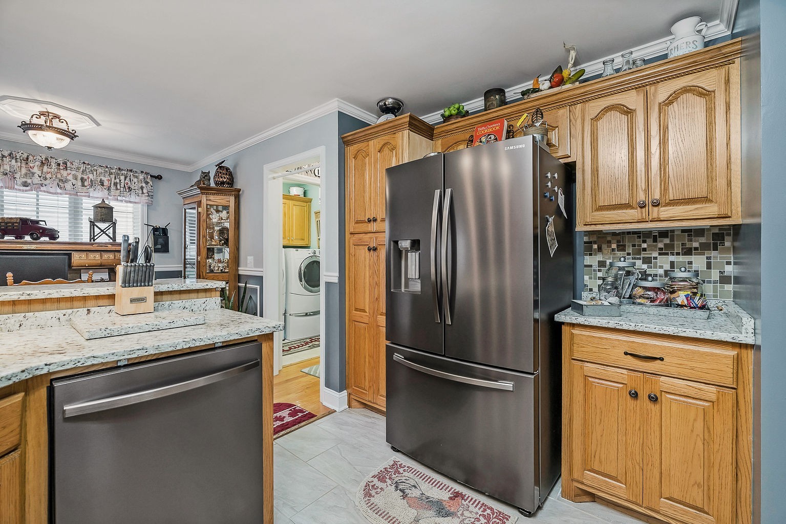 128 Simons Boulevard Morrison, TN 37357 - Photo 40 of 65 a kitchen with stainless steel appliances granite countertop a refrigerator and a sink
