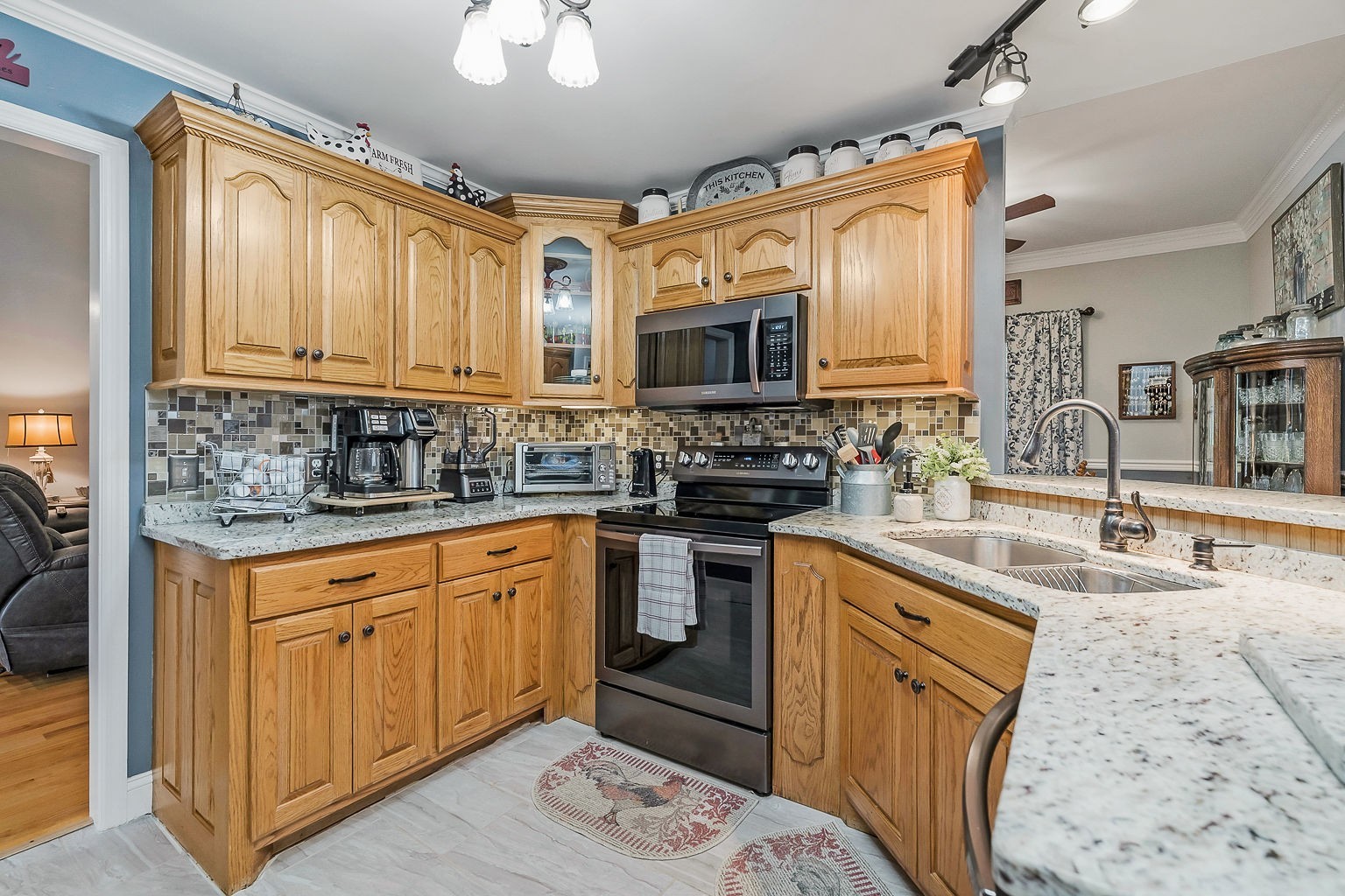 128 Simons Boulevard Morrison, TN 37357 - Photo 41 of 65 a kitchen with stainless steel appliances granite countertop a sink stove and cabinets