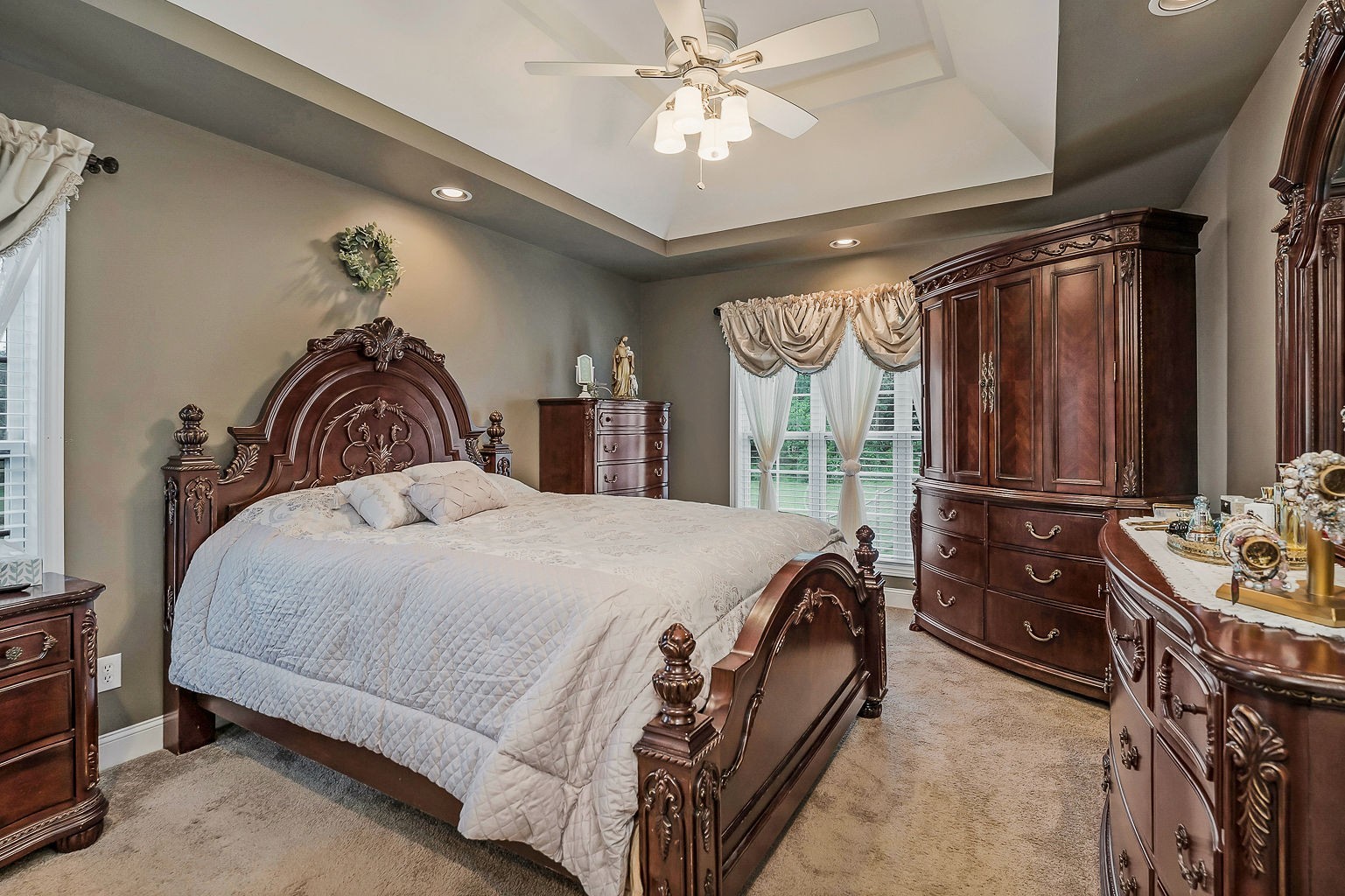 128 Simons Boulevard Morrison, TN 37357 - Photo 51 of 65 a bedroom with a bed and a chandelier