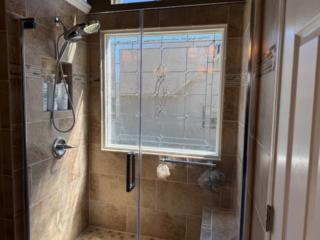 128 Simons Boulevard Morrison, TN 37357 - Photo 56 of 65 a bathroom with a glass shower door