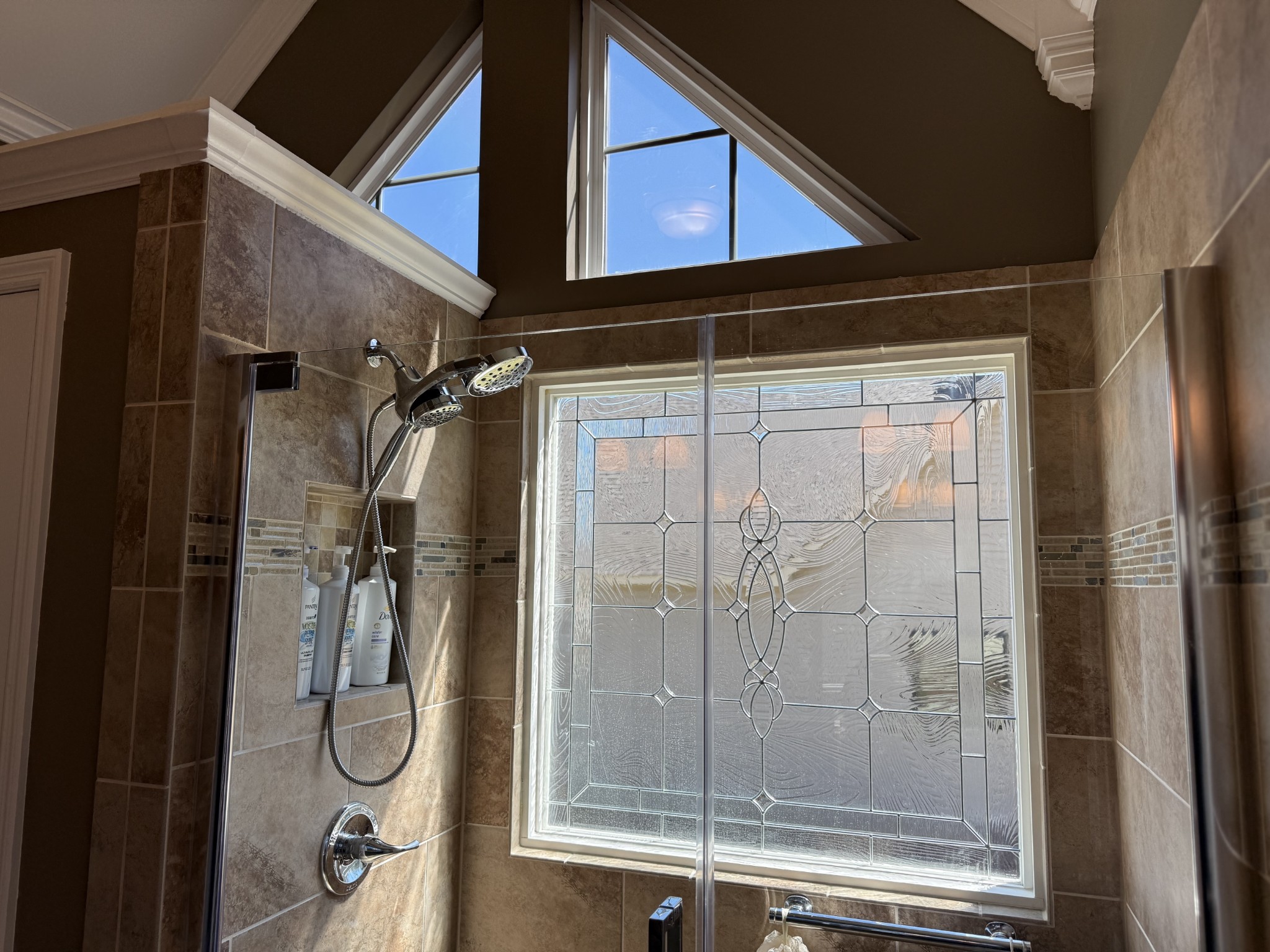 128 Simons Boulevard Morrison, TN 37357 - Photo 57 of 65 a bathroom with a glass door shower and mirror