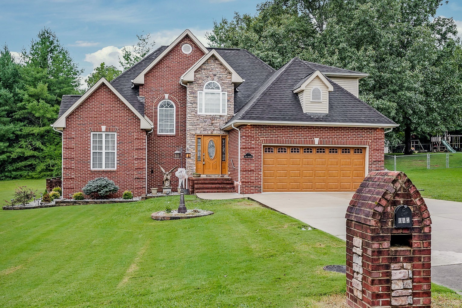 128 Simons Boulevard Morrison, TN 37357 - Photo 7 of 65 front view of a house with a yard