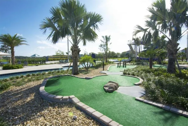 a view of a swimming pool and outdoor space