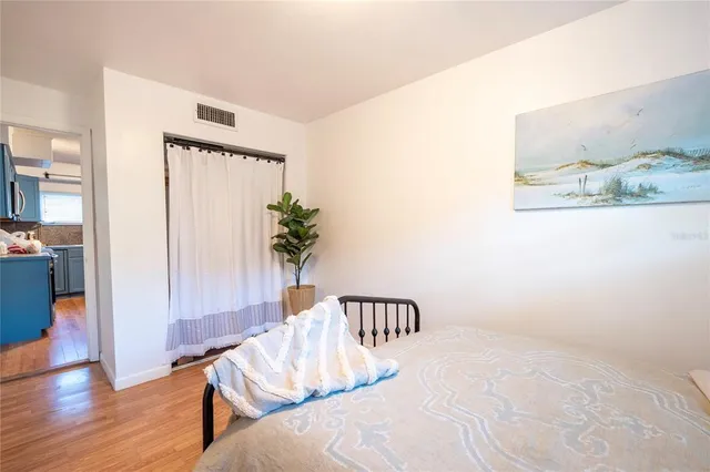 a bath room with a toilet and a shower