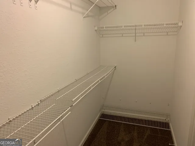 a view of a room with racks on the wall