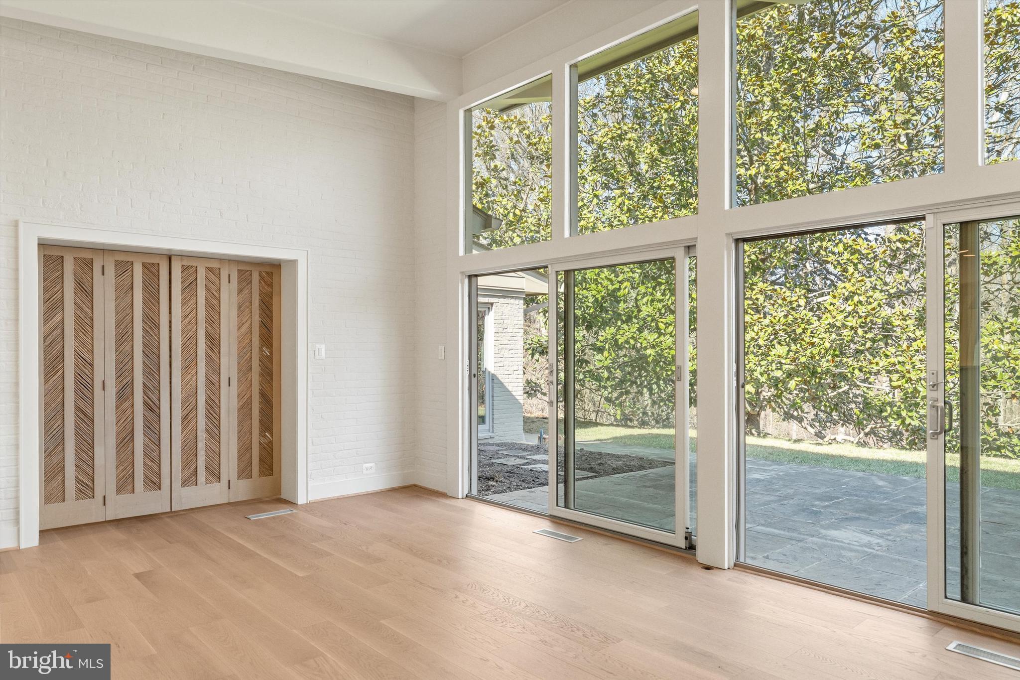 1402 Langley Place McLean, VA 22101 - Photo 27 of 46 Ornate decorative doors between Fam and Liv Rm