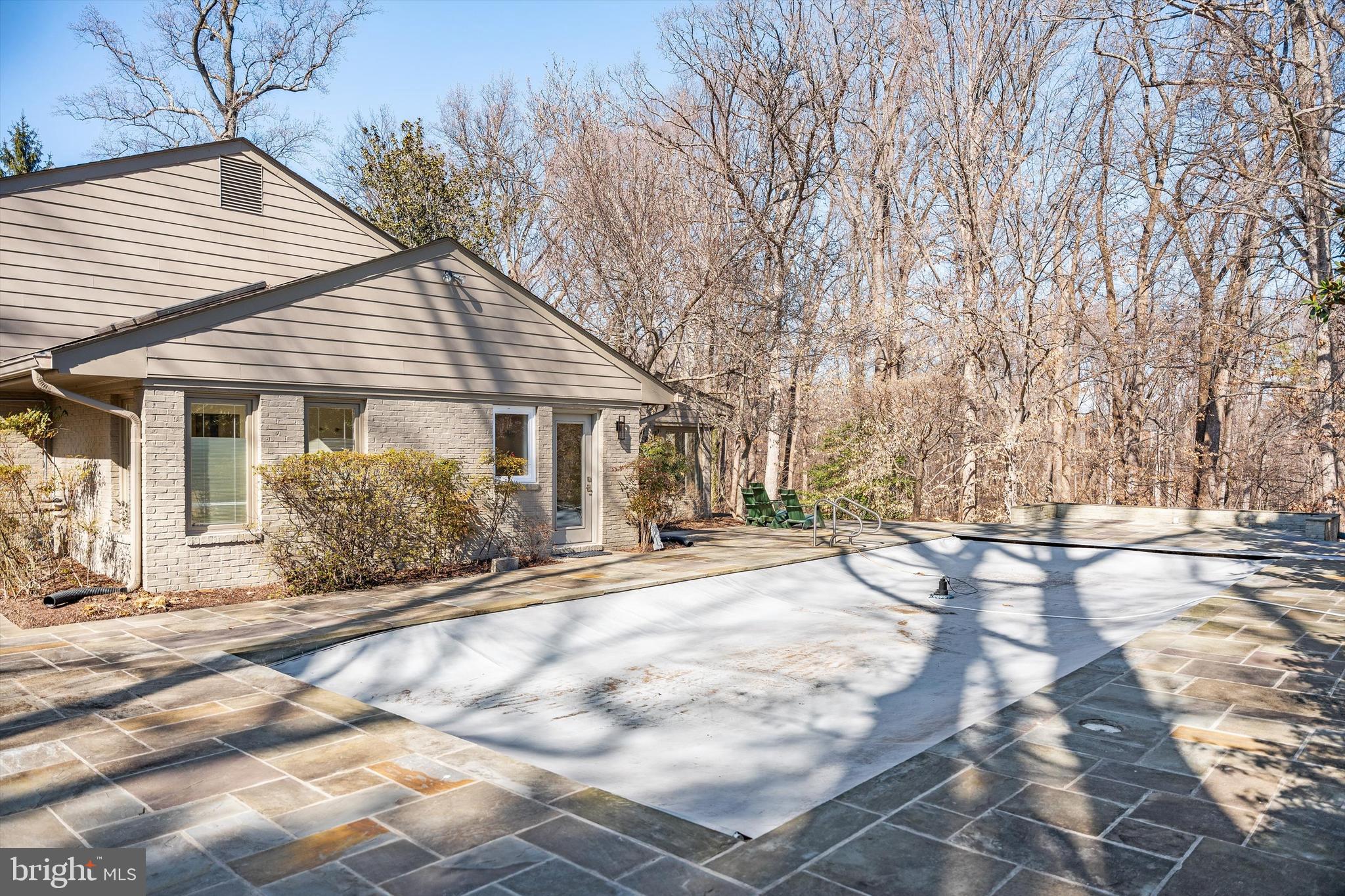1402 Langley Place McLean, VA 22101 - Photo 42 of 46 In-ground swimming pool overlooks wooded privacy