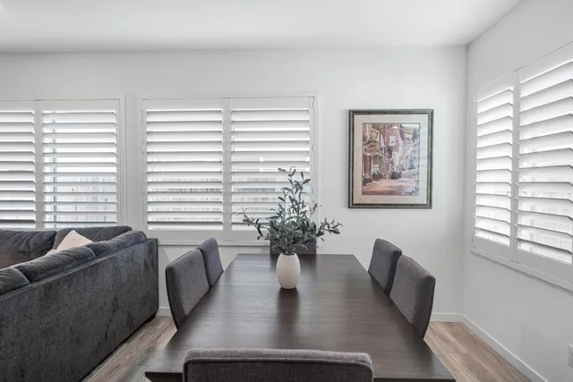 a view of a pathway of a house with backyard and tub