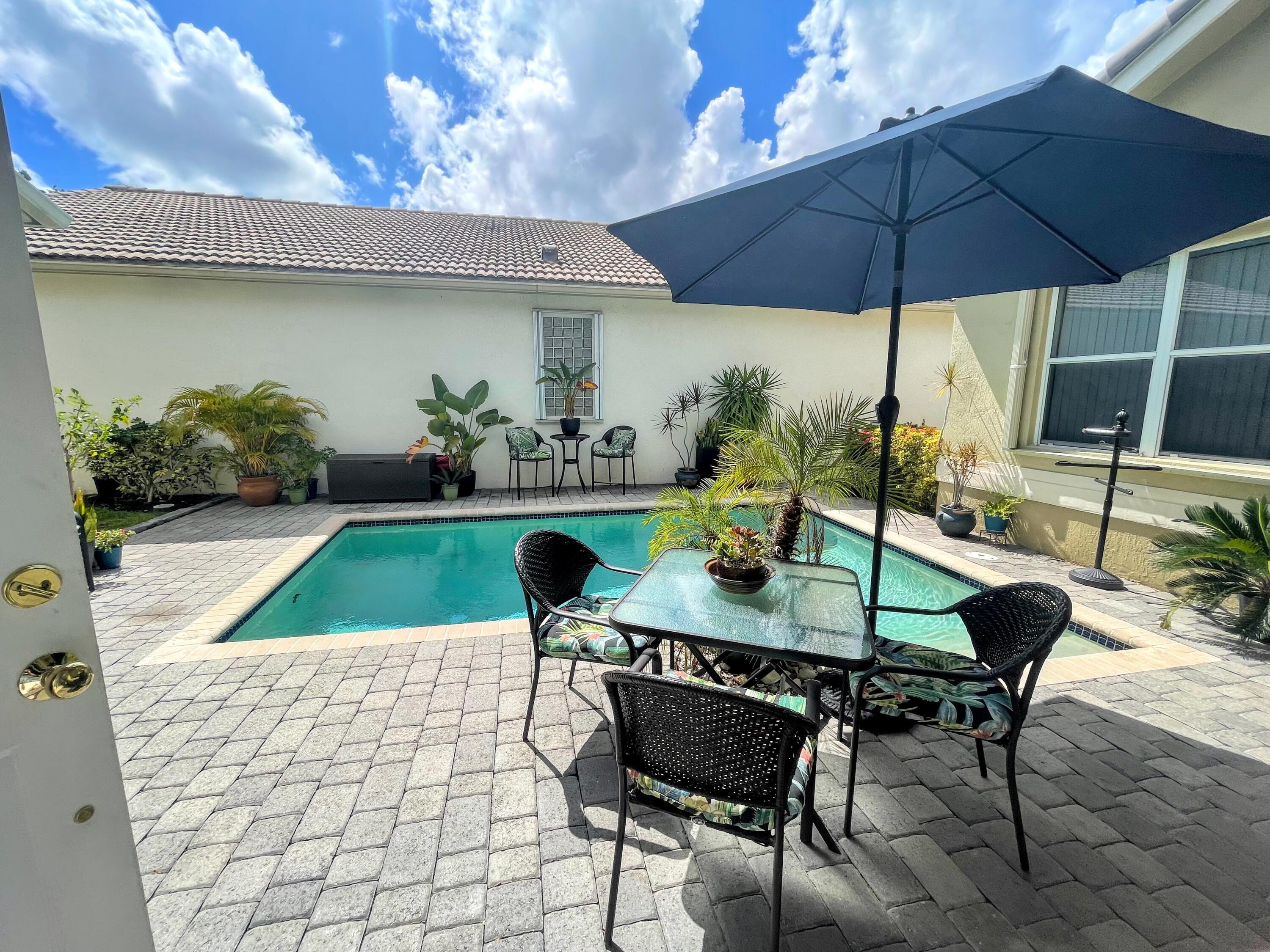 7060 Northwest Turtle Walk Boca Raton, FL 33487 - Photo 8 of 51 Courtyard