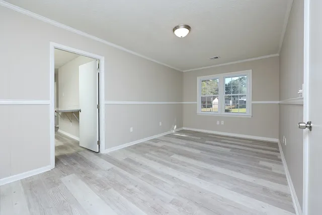 an empty room with windows