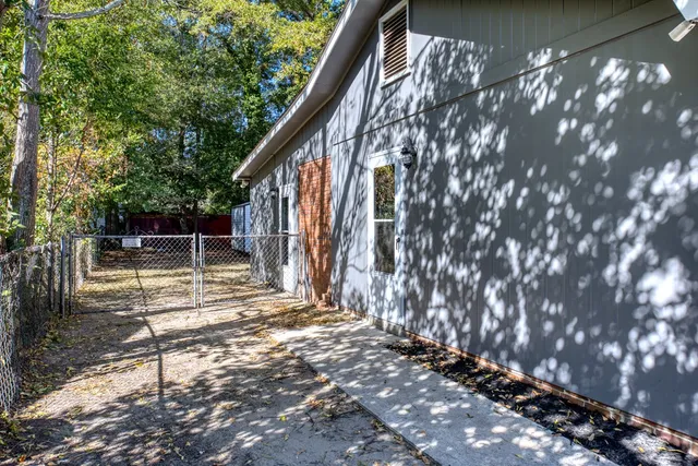 a view of backyard with green space