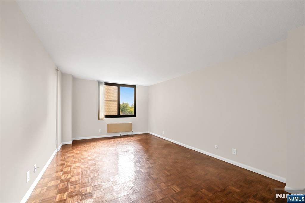 326 Prospect Avenue, Unit 6J Hackensack, NJ 07601 - Photo 14 of 18 a view of an empty room with window