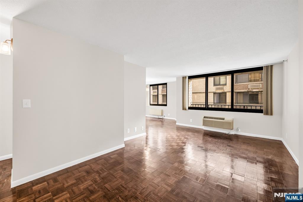 326 Prospect Avenue, Unit 6J Hackensack, NJ 07601 - Photo 10 of 18 a view of an empty room with a window