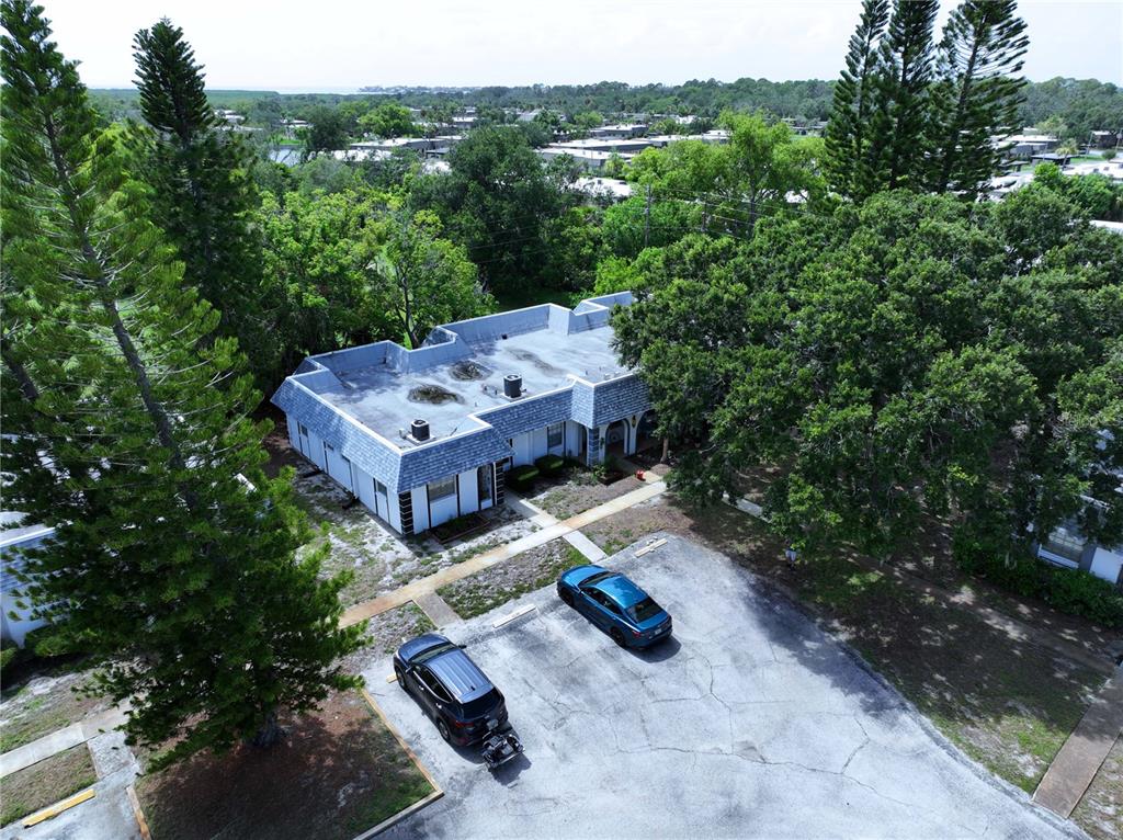 4237 Redcliff Place New Port Richey, FL 34652 - Photo 2 of 25 an aerial view of a house with a yard