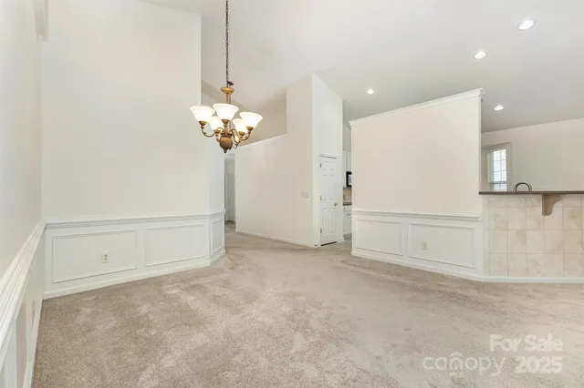 a view of a livingroom with chandelier