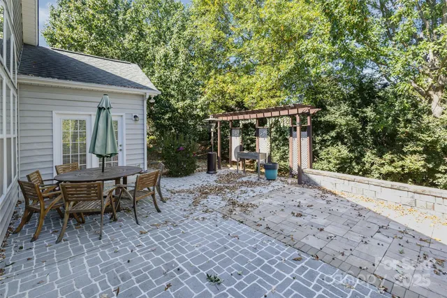 a view of a sitting area with furniture in back yard