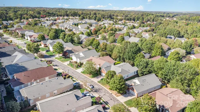 an aerial view of a city with lots of residential buildings