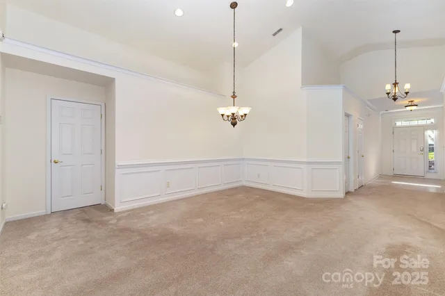 a view of a room with an empty space