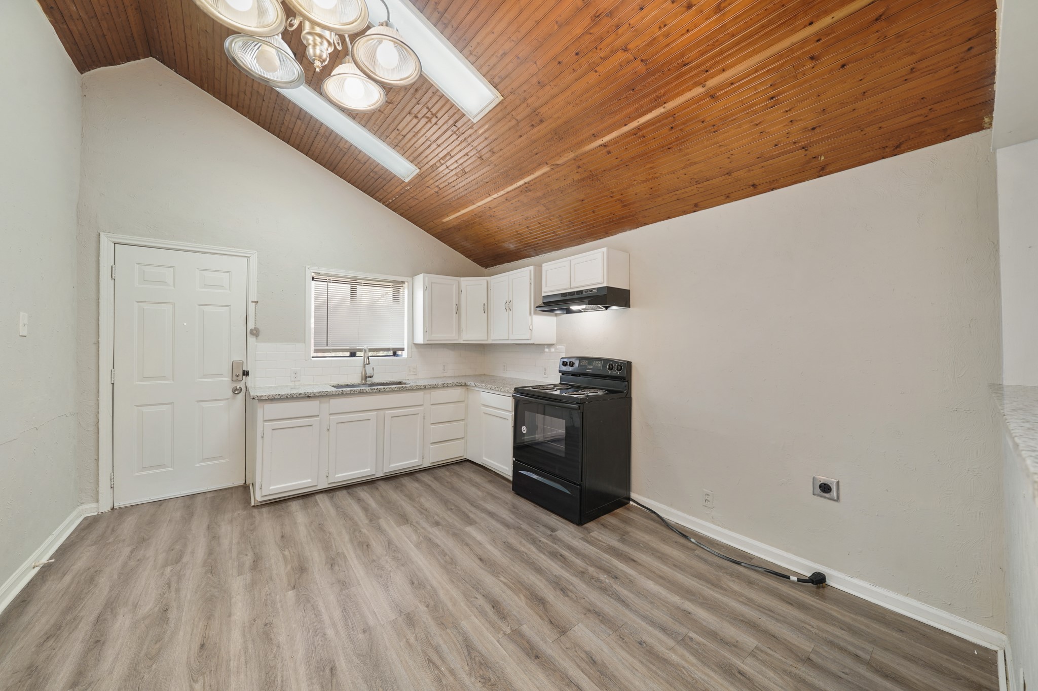10001 Lucore Street, Unit FRONT Houston, TX 77017 - Photo 3 of 11 a large white room with a large window