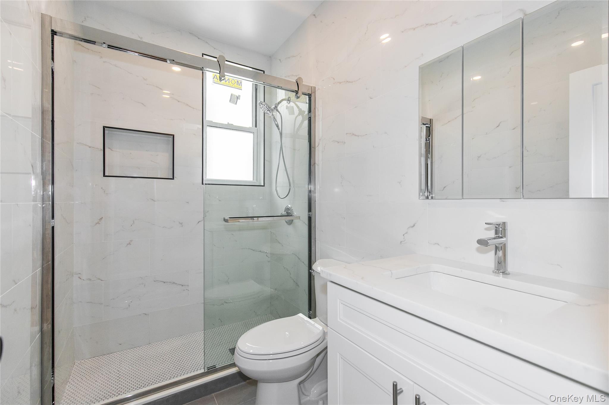 104-44 42nd Avenue Queens, NY 11368 - Photo 13 of 16 a bathroom with a sink toilet and shower