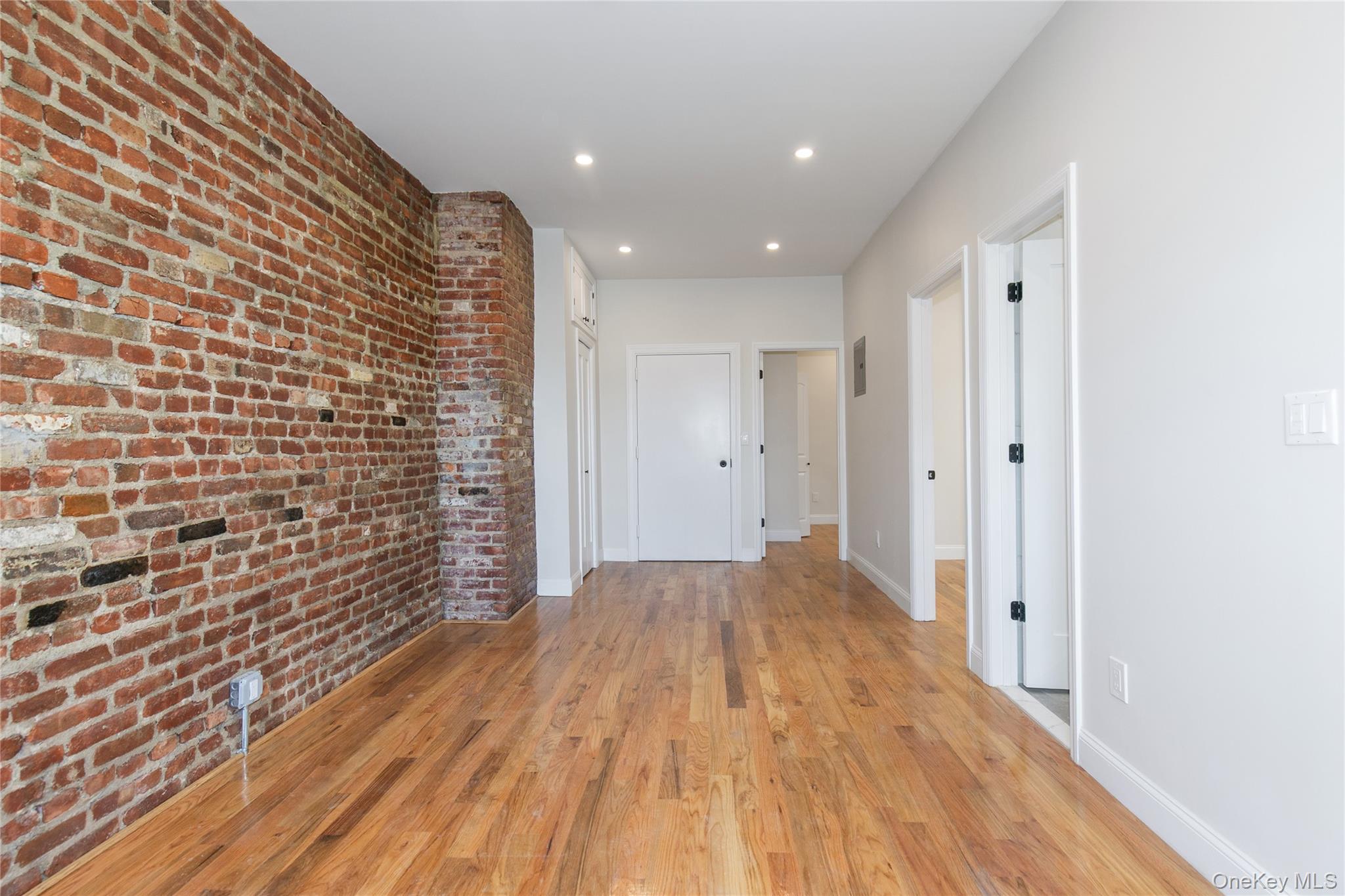 104-44 42nd Avenue Queens, NY 11368 - Photo 2 of 16 a view of hallway with wooden floor