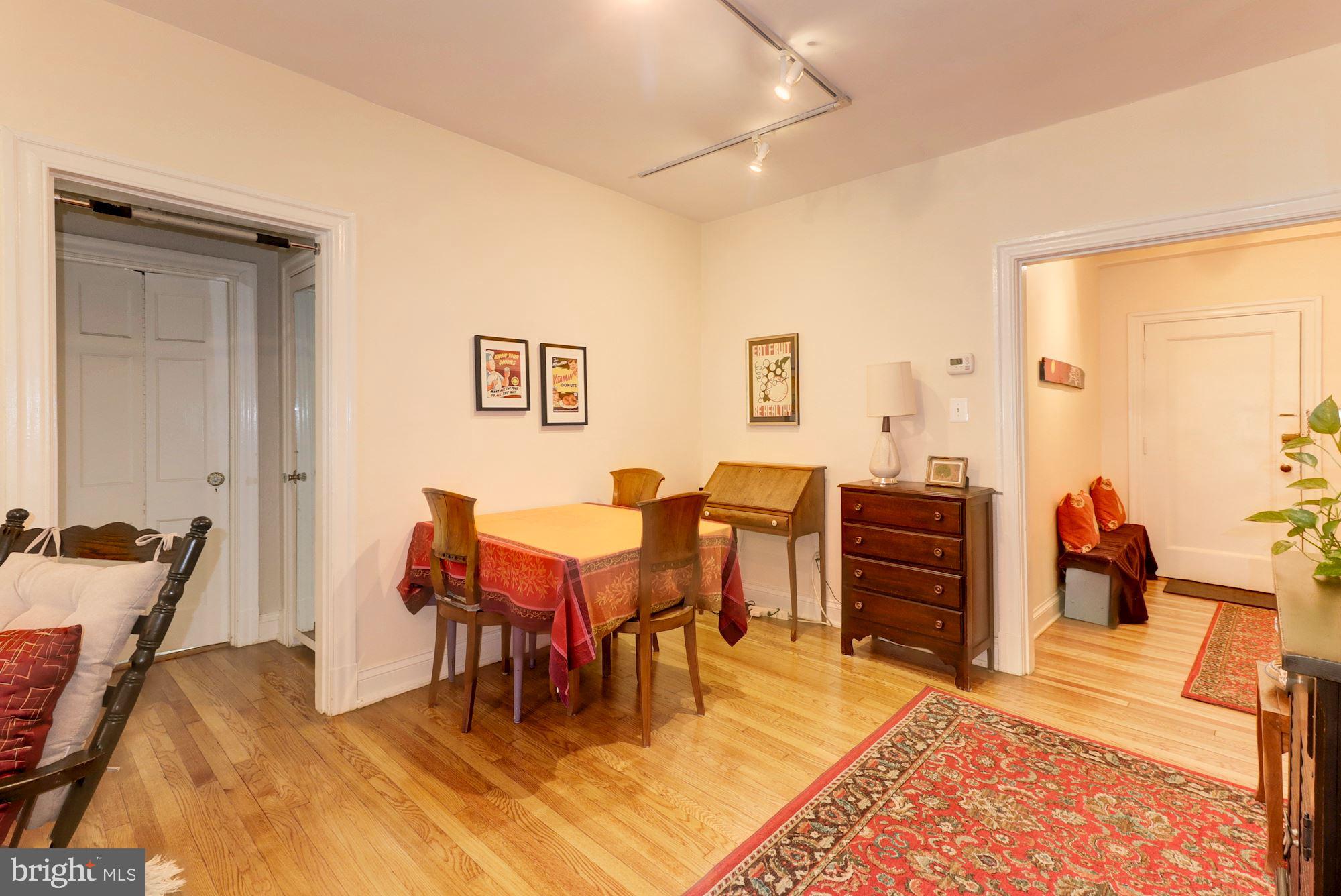 2801 Adams Mill Road Northwest, Unit 111 Washington, DC 20009 - Photo 9 of 24 Dining Area with nice hardwood floors