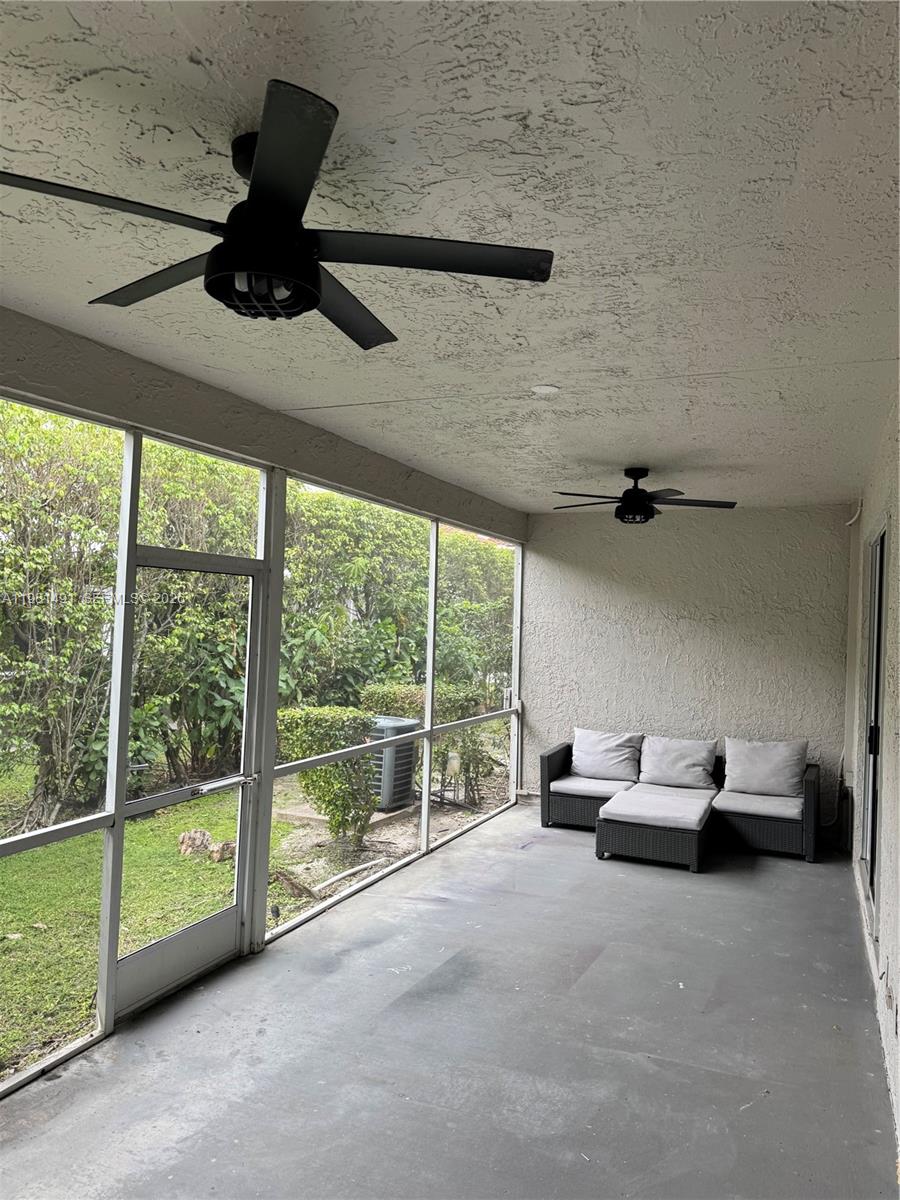 20478 Vía Marisa Boca Raton, FL 33498 - Photo 14 of 18 a very nice looking room with a large window