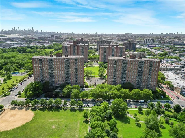 a view of a livingroom with furniture and a flat screen tv