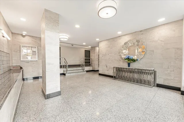 a view of an empty room with a sliding door