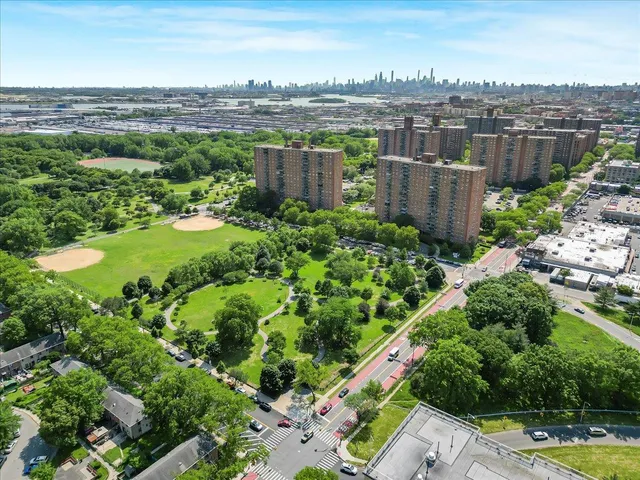 a view of a swimming pool with a garden