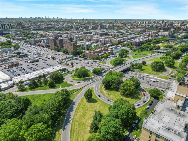 an aerial view of a residential houses with outdoor space