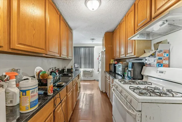 a bedroom with bed and a window