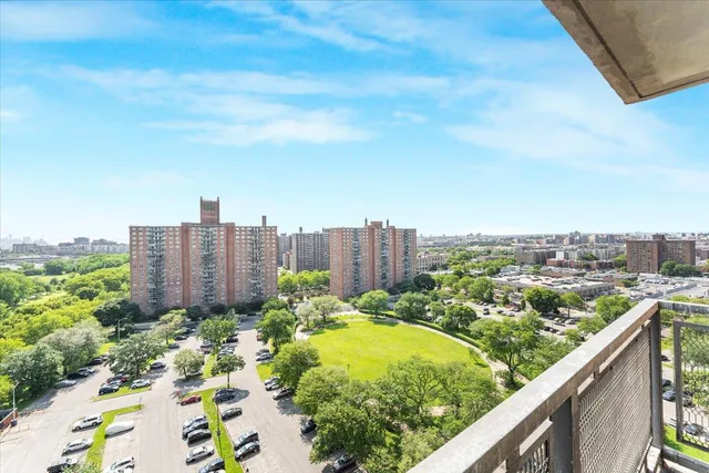 a view of a balcony with city view