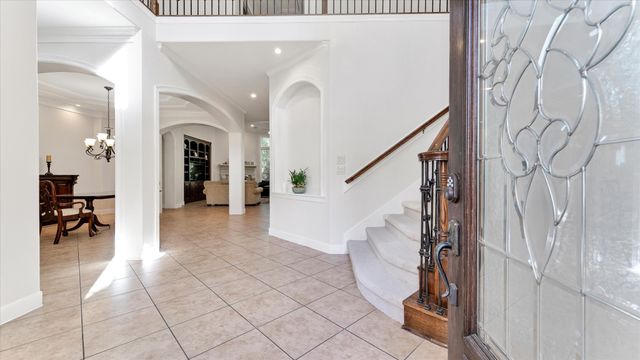 a view of entryway and hall with a window