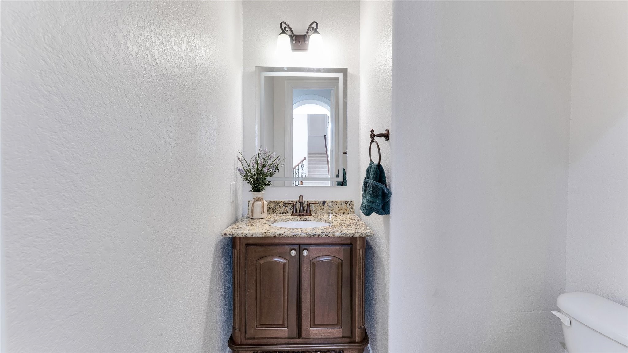 3 North Fair Manor Circle Spring, TX 77382 - Photo 9 of 39 a bathroom with a sink and a mirror