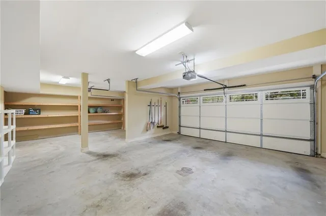 a front view of a building with a yard