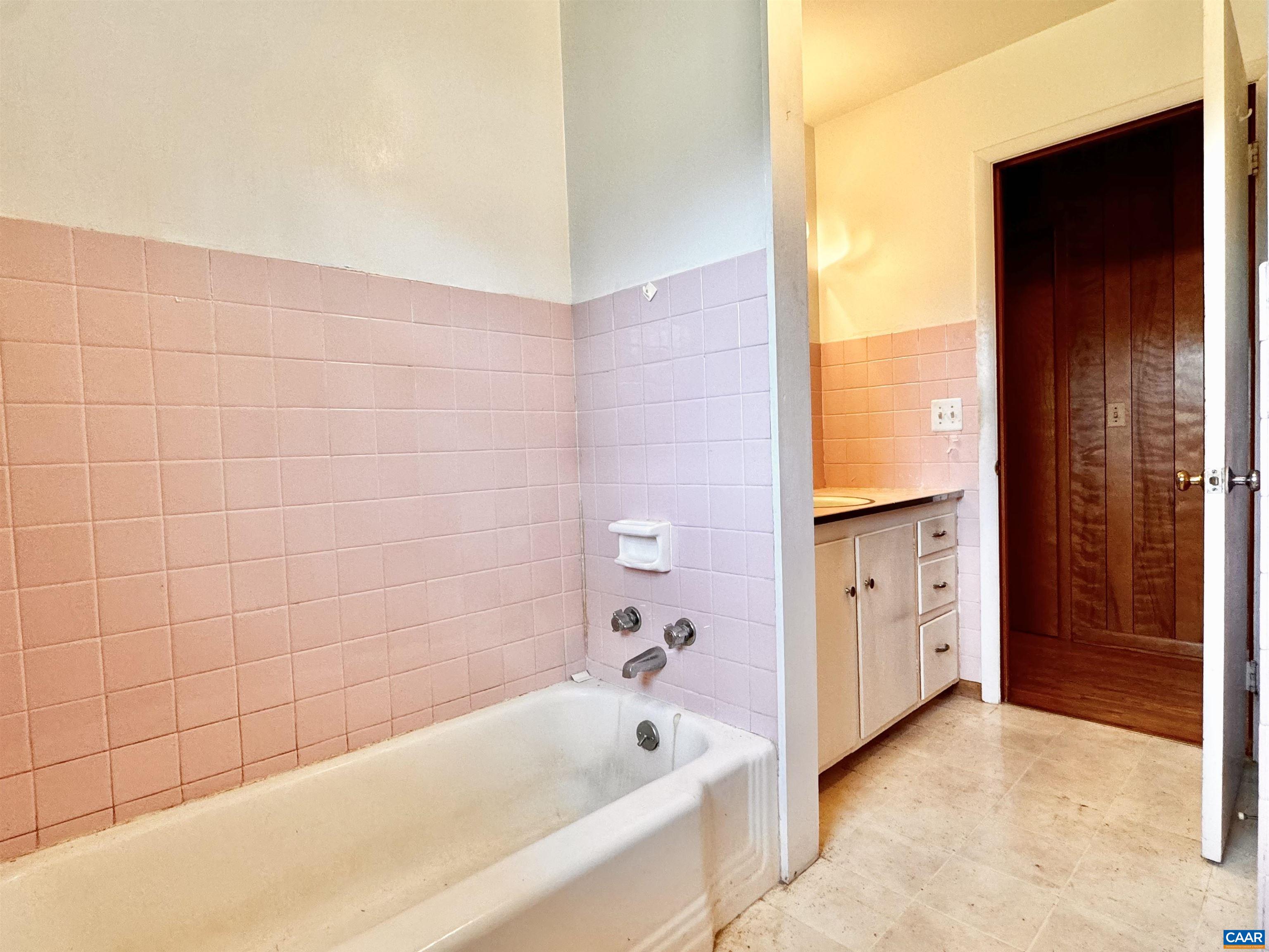 14540 Spotswood Trail Ruckersville, VA 22968 - Photo 15 of 42 a bathroom with a bathtub and a shower