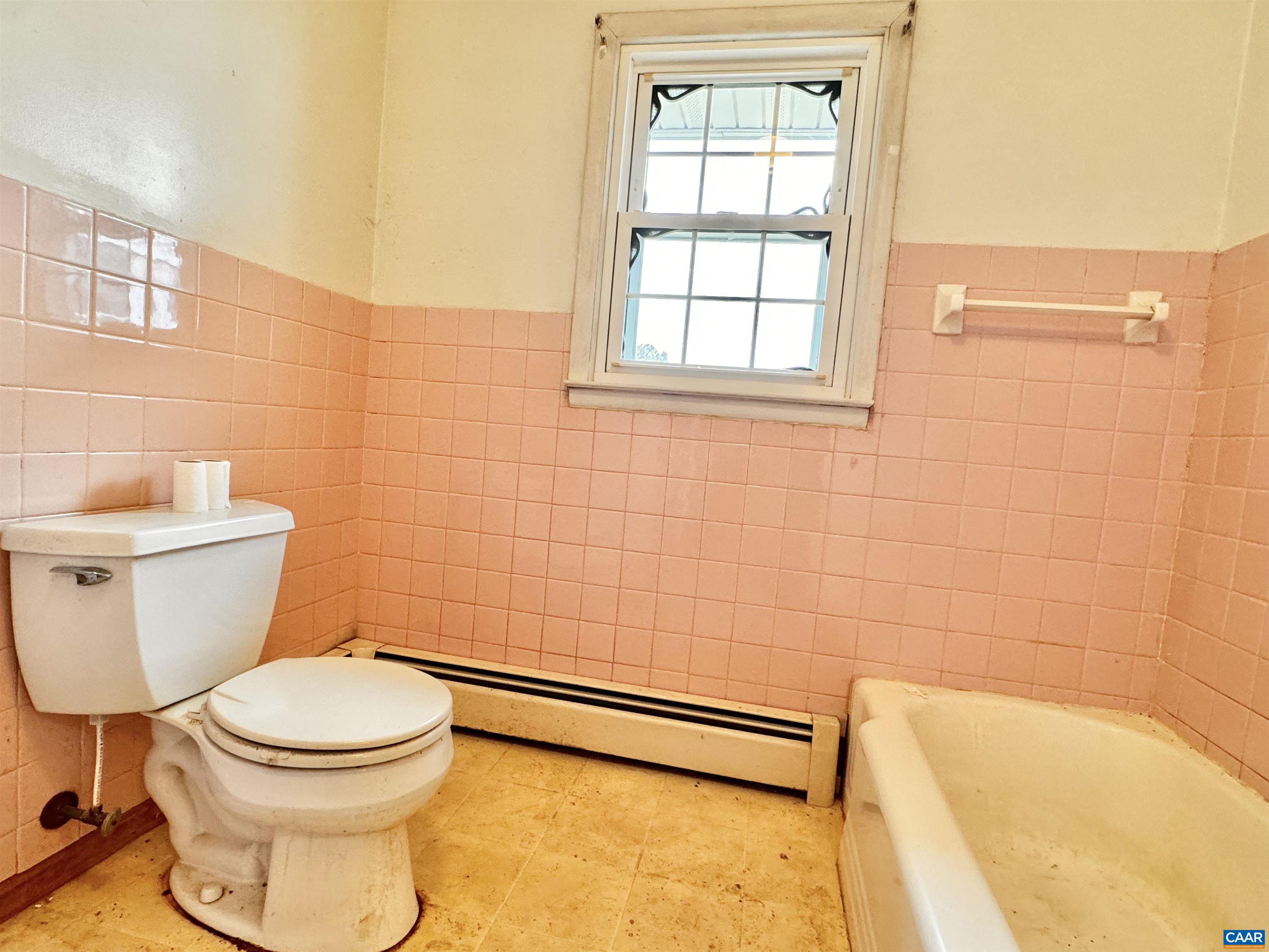 14540 Spotswood Trail Ruckersville, VA 22968 - Photo 16 of 42 a bathroom with a toilet and a bathtub
