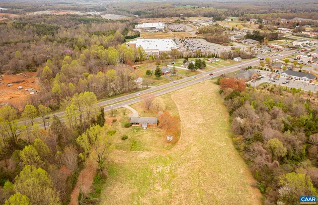 a bathroom with a white wall