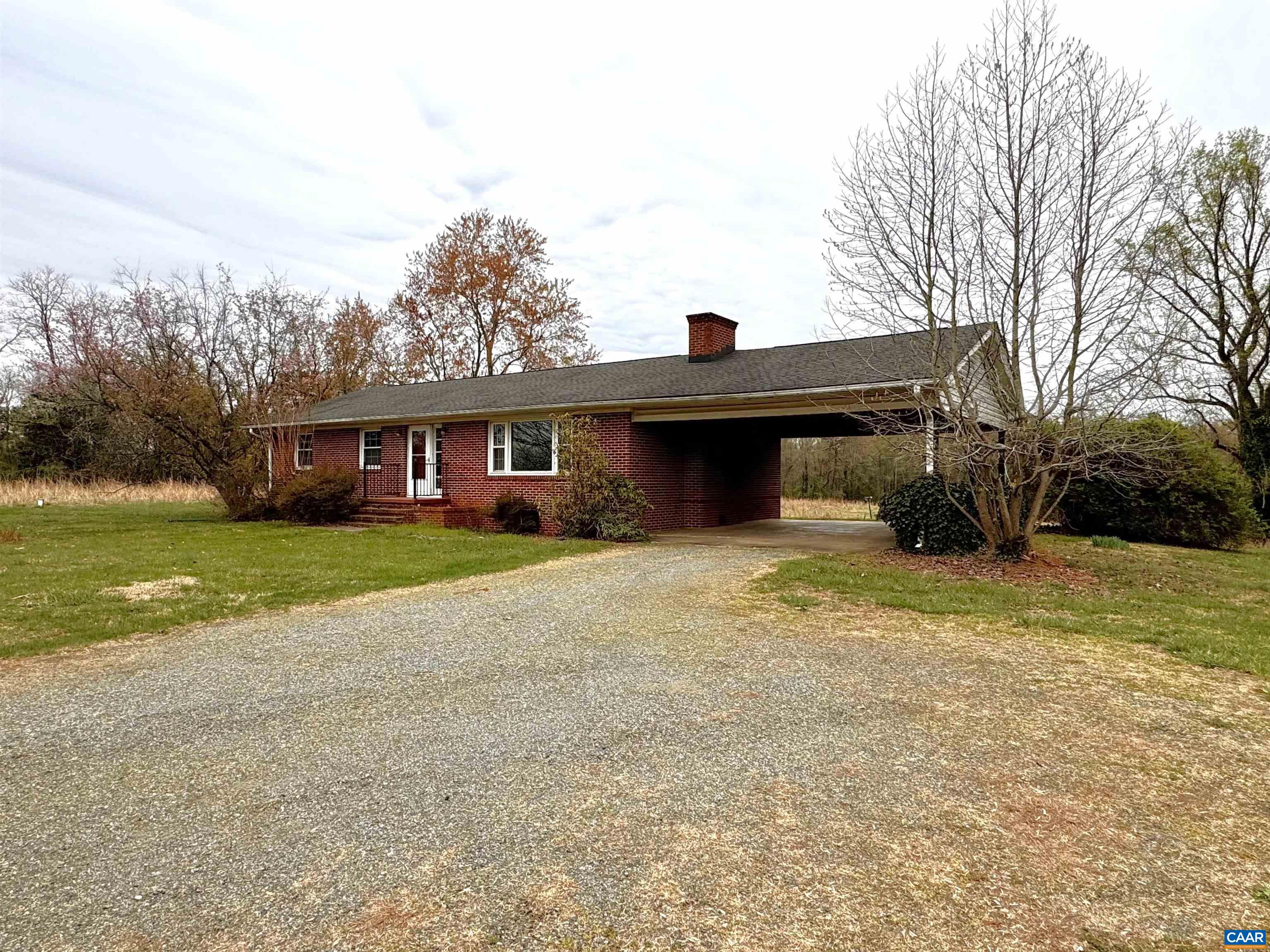 14540 Spotswood Trail Ruckersville, VA 22968 - Photo 4 of 42 a front view of a house with garden