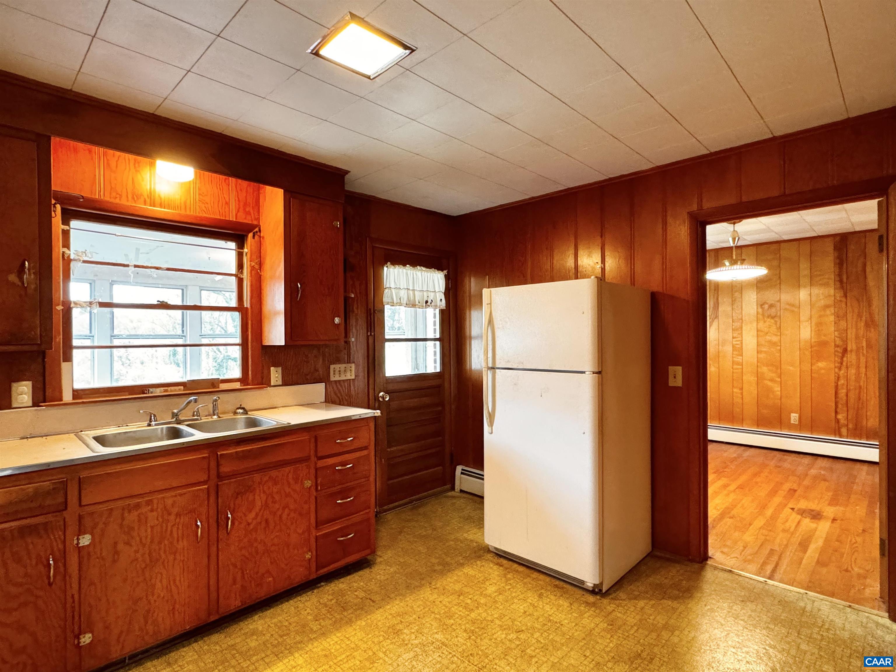 14540 Spotswood Trail Ruckersville, VA 22968 - Photo 6 of 42 a kitchen with stainless steel appliances granite countertop a refrigerator a sink and dishwasher
